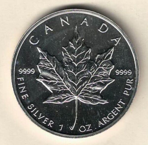 1989 Silver Canada One Ounce Maple. Elizabeth II is on the obverse, The Maple is on the reverse. The coin contains one ounce of 9999 fine silver.