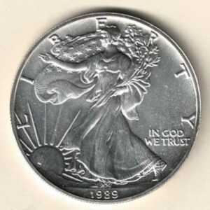 1989 Silver USA One Ounce Eagle. The liberty is on the obverse, The eagle is on the reverse. The coin contains one ounce of 999 fine silver.