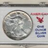 1990 Silver USA One Ounce Eagle cased . The liberty is on the obverse, The eagle is on the reverse. The coin contains one ounce of 999 fine silver.