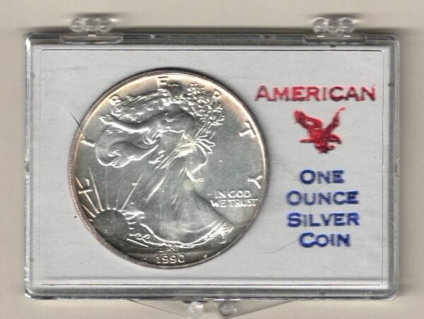 1990 Silver USA One Ounce Eagle cased . The liberty is on the obverse, The eagle is on the reverse. The coin contains one ounce of 999 fine silver.