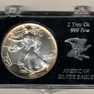 1992 Silver USA One Ounce Eagle cased . The liberty is on the obverse, The eagle is on the reverse. The coin contains one ounce of 999 fine silver.