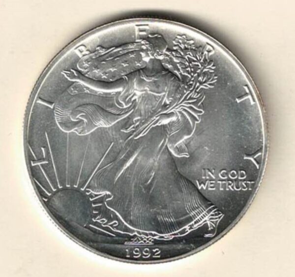 1992 Silver USA One Ounce Eagle. The liberty is on the obverse, The eagle is on the reverse. The coin contains one ounce of 999 fine silver.