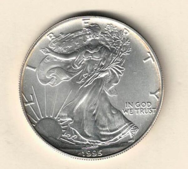 1995 Silver USA One Ounce Eagle. The liberty is on the obverse, The eagle is on the reverse. The coin contains one ounce of 999 fine silver.