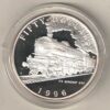 1996 Silver Marshall Islands One Ounce FS Group 691 Train. This coin does feature a train. This coin contains one ounce of 999 fine silver.