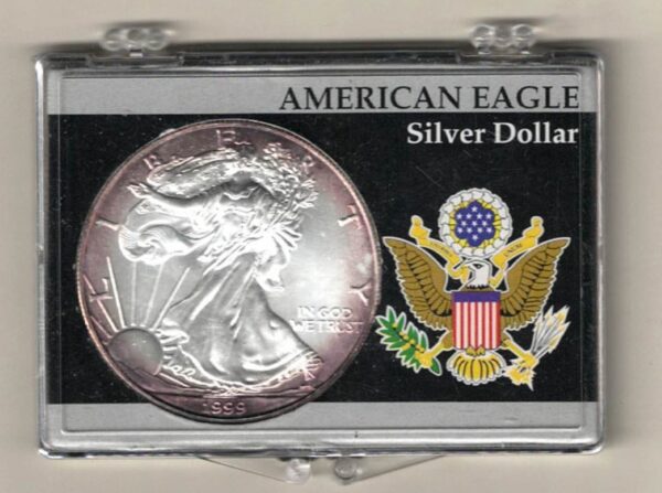 1999 Silver USA One Ounce Eagle cased . The liberty is on the obverse, The eagle is on the reverse. The coin contains one ounce of 999 fine silver.