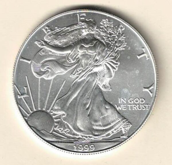 1999 Silver USA One Ounce Eagle. The liberty is on the obverse, The eagle is on the reverse. The coin contains one ounce of 999 fine silver.