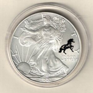 2002 Silver USA One Ounce Eagle. The liberty & Horse Privy Mark on the obverse, The eagle is on the reverse. The coin contains one ounce of 999 fine silver.