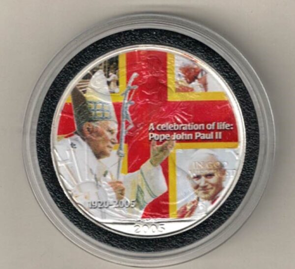 2005 Silver USA One Ounce Eagle. The liberty & The Pope is on the obverse, The eagle is on the reverse. The coin contains one ounce of 999 fine silver.