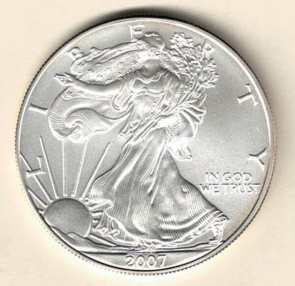 2007 Silver USA One Ounce Eagle. The liberty is on the obverse, The eagle is on the reverse. The coin contains one ounce of 999 fine silver.