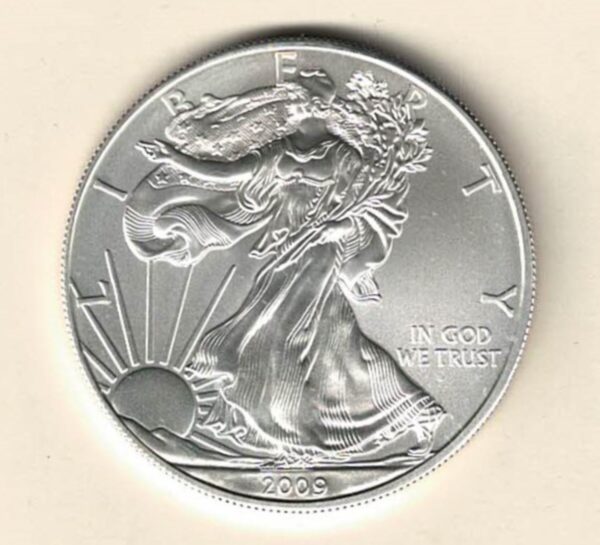 2009 Silver USA One Ounce Eagle. The liberty is on the obverse, The eagle is on the reverse. The coin contains one ounce of 999 fine silver.