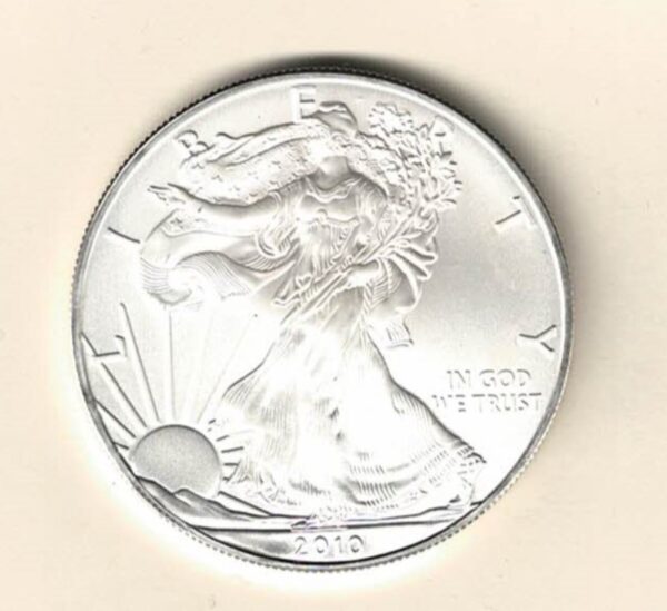 2010 Silver USA One Ounce Eagle. The liberty is on the obverse, The eagle is on the reverse. The coin contains one ounce of 999 fine silver.