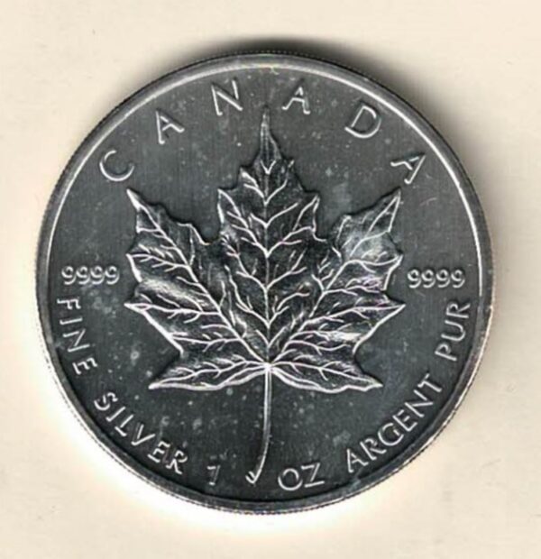 2010 Silver Canada One Ounce Maple. Elizabeth II is on the obverse, The Maple is on the reverse. The coin contains one ounce of 9999 fine silver.