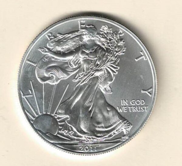 2011 Silver USA One Ounce Eagle. The liberty is on the obverse, The eagle is on the reverse. The coin contains one ounce of 999 fine silver.