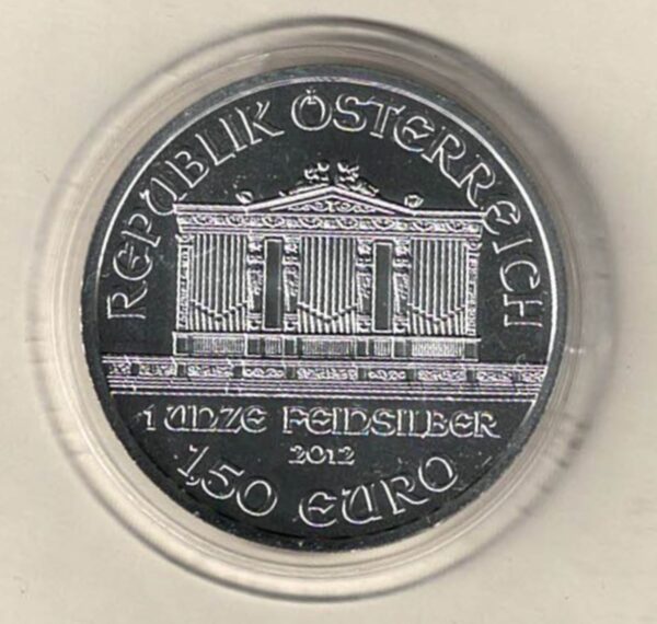 2012 Silver Austria One Ounce Philharmonic. This Coin does feature Music Instrument's The coin contains one ounce of 999 fine silver.