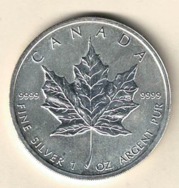 2012 Silver Canada One Ounce Maple. Elizabeth II is on the obverse, The Maple is on the reverse. The coin contains one ounce of 9999 fine silver.