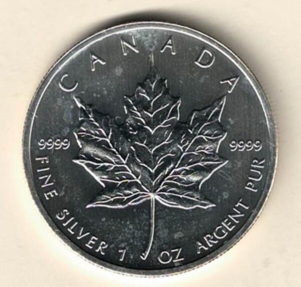 2013 Silver Canada One Ounce Maple. Elizabeth II is on the obverse, The Maple is on the reverse. The coin contains one ounce of 9999 fine silver.