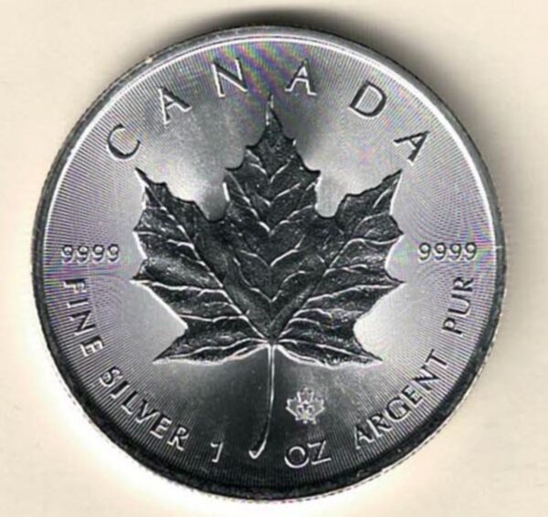 2014 Silver Canada One Ounce Maple. Elizabeth II is on the obverse, The Maple is on the reverse. The coin contains one ounce of 9999 fine silver.