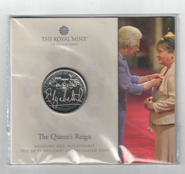 2022 Five Pounds featuring Queen Elizabeth II on the Obverse and the bestowing of her honour the Reverse side of the coin.