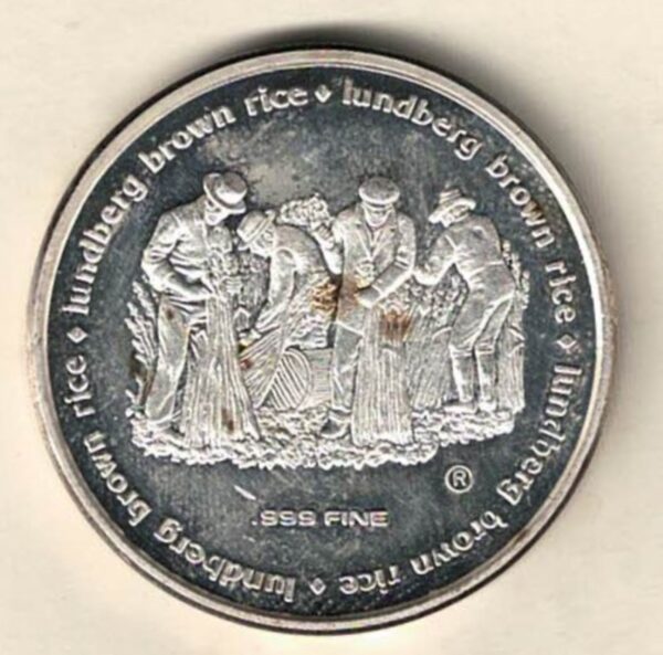 Silver One Ounce Lundberg Brown Rice. This round does features Silver One Ounce Lundberg Brown Rice. The round contains one ounce of .999 fine silver