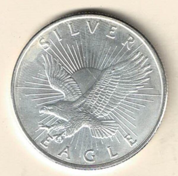 No Date Silver One Ounce Sunshine Minting Eagle. This round does feature an eagle in flight. The round contains one ounce of .999 fine silver.