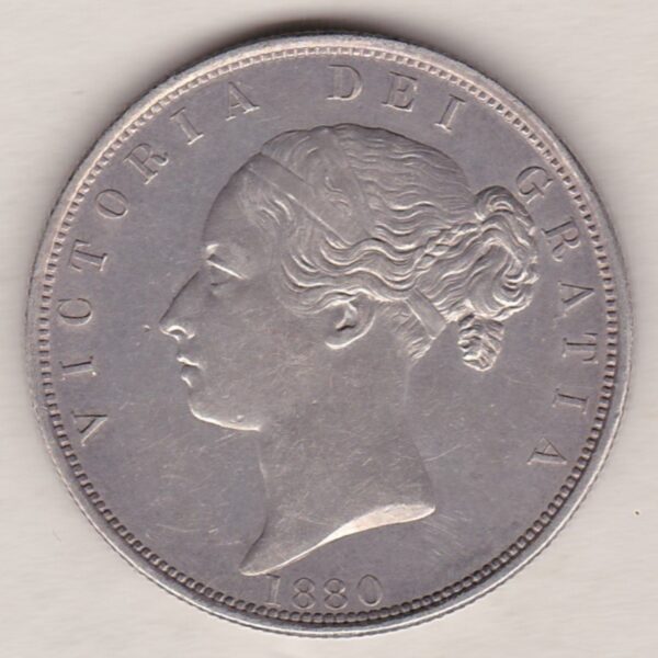 1880 Silver Halfcrown coin with young head Queen Victoria on the Obverse. Crowned square shield with laurel branches on the Reverse.