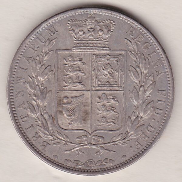 1881 Silver Halfcrown coin with young head Queen Victoria on the Obverse. Crowned square shield with laurel branches on the Reverse.