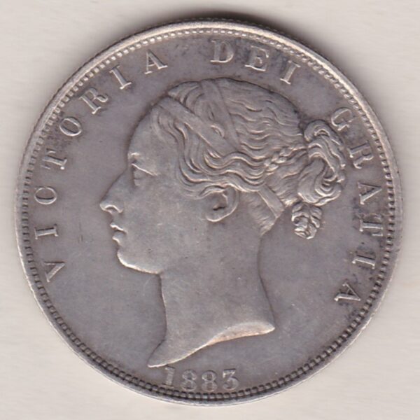 1883 Silver Halfcrown coin with young head Queen Victoria on the Obverse. Crowned square shield with laurel branches on the Reverse.