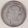 1885 Silver Halfcrown coin with young head Queen Victoria on the Obverse. Crowned square shield with laurel branches on the Reverse.