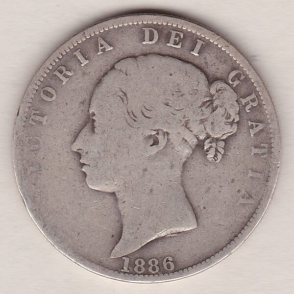 1886 Silver Halfcrown coin with young head Queen Victoria on the Obverse. Crowned square shield with laurel branches on the Reverse.