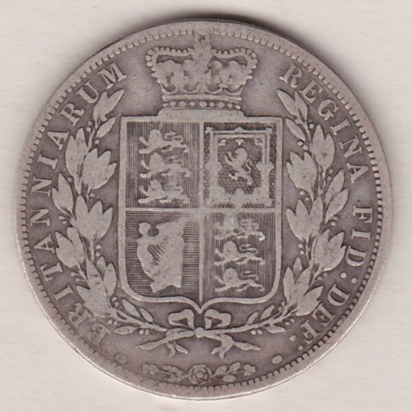 1886 Silver Halfcrown coin with young head Queen Victoria on the Obverse. Crowned square shield with laurel branches on the Reverse.