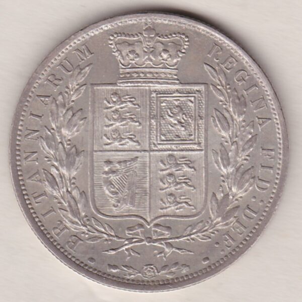 1887 Silver Halfcrown coin with young head Queen Victoria on the Obverse. Crowned square shield with laurel branches on the Reverse.