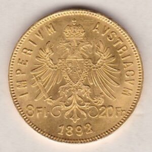 1892 Austria Gold 8 florins 20 franc featuring the portrait of Emperor Franz Joseph I on the Obverse. The double-headed imperial eagle is on the Reverse.