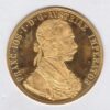 1915 Austria Gold Four Ducat featuring the portrait of Emperor Franz Joseph I on the Obverse. The double-headed imperial eagle is on the Reverse.