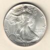 1986 Silver USA One Ounce Eagle. The liberty is on the obverse, The eagle is on the reverse. The coin contains one ounce of 999 fine silver.