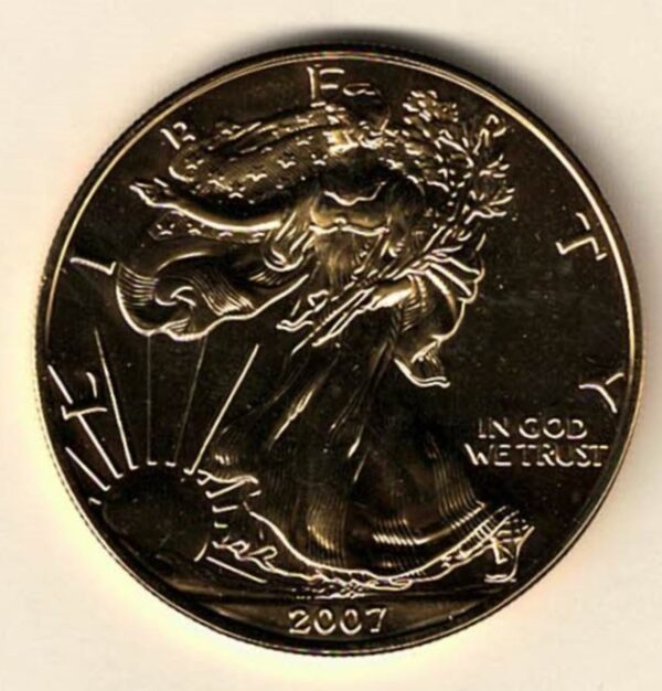 Gold Plated 2007 Silver USA One Ounce Eagle. The liberty is on the obverse, The eagle is on the reverse. The coin contains one ounce of 999 fine silver.