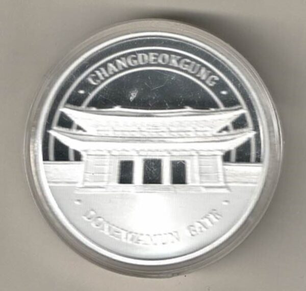 Silver Korea One Ounce Donhwamun Gate. This round contains one ounce of .999 fine silver. This round features Donhwaun Gate.