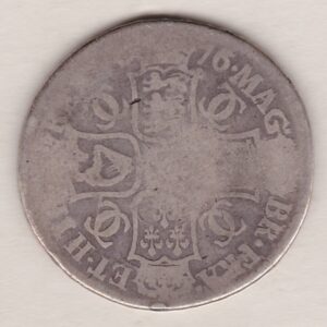 1676 Silver Halfcrown coin. The obverse features King Charles II. The reverse features the crowned cruciform shields around central Garter star.