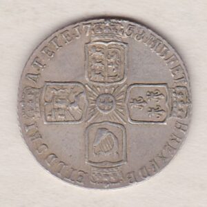 1758 silver sixpence coin featuring a laureate bust of George II. There are four crowned shields arranged in a cross on the Reverse.