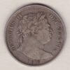 1816 Silver Halfcrown coin with King George III on the Obverse. The reverse features a a crowned Garter and ornate Royal shield of arms.