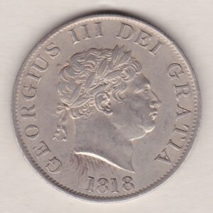 1818 Silver Halfcrown coin with King George III on the Obverse. The reverse features a a crowned and quartered ornate shield of arms.