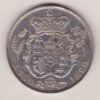 1820 Silver Halfcrown coin with King George IV on the Obverse. The reverse features the first crowned and Mantled shield of arms.