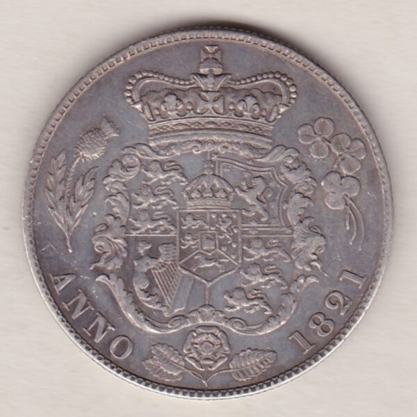 1821 Silver Halfcrown coin with King George IV on the Obverse. The reverse features the first crowned and Mantled shield of arms.