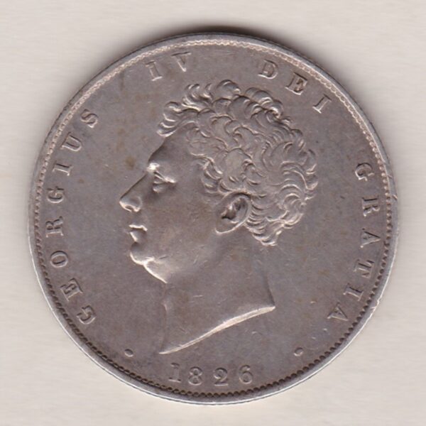 1826 Silver Halfcrown coin with King George IV on the Obverse. A crowned and mantled shield of arms over a banner, with legend around. on the reverse.