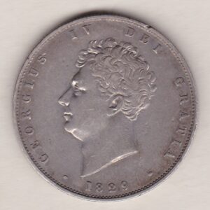 1829 Silver Halfcrown coin with King George IV on the Obverse. A crowned and mantled shield of arms over a banner, with legend around. on the reverse.