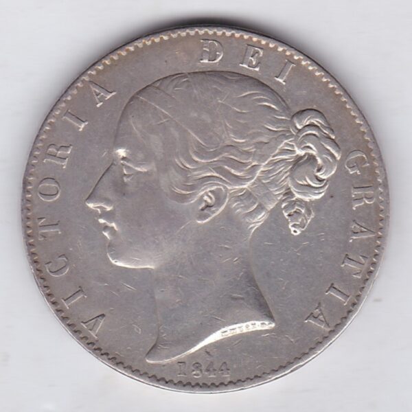 1844 Star Silver Crown Coin featuring Queen Victoria Young head on the Obverse and the Shield design on the reverse. In fair to fine condition.