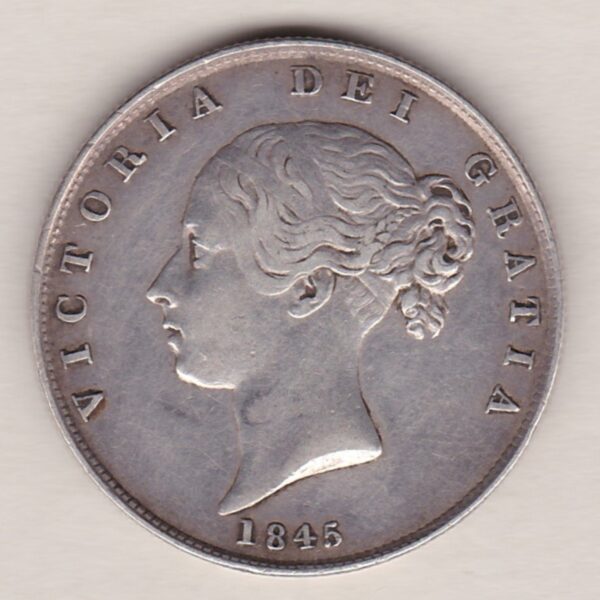 1845 Silver Halfcrown coin with young head Queen Victoria on the Obverse. Crowned square shield with laurel branches on the Reverse.