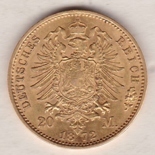 1872 A Germany Gold Twenty Mark coin featuring the bust of Wilhelm I on the obverse. The crowned imperial eagle on the reverse.