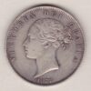 1877 Silver Halfcrown coin with young head Queen Victoria on the Obverse. Crowned square shield with laurel branches on the Reverse.