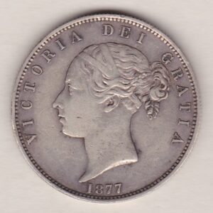 1877 Silver Halfcrown coin with young head Queen Victoria on the Obverse. Crowned square shield with laurel branches on the Reverse.