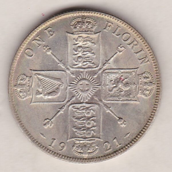 1921 Silver Florin coin. The portrait of King George V on the Obverse. The crowned cruciform shields around central Garter star on the reverse.